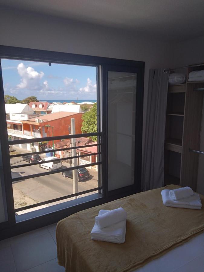 Le Yuka Apartment Saint-Francois  Bagian luar foto